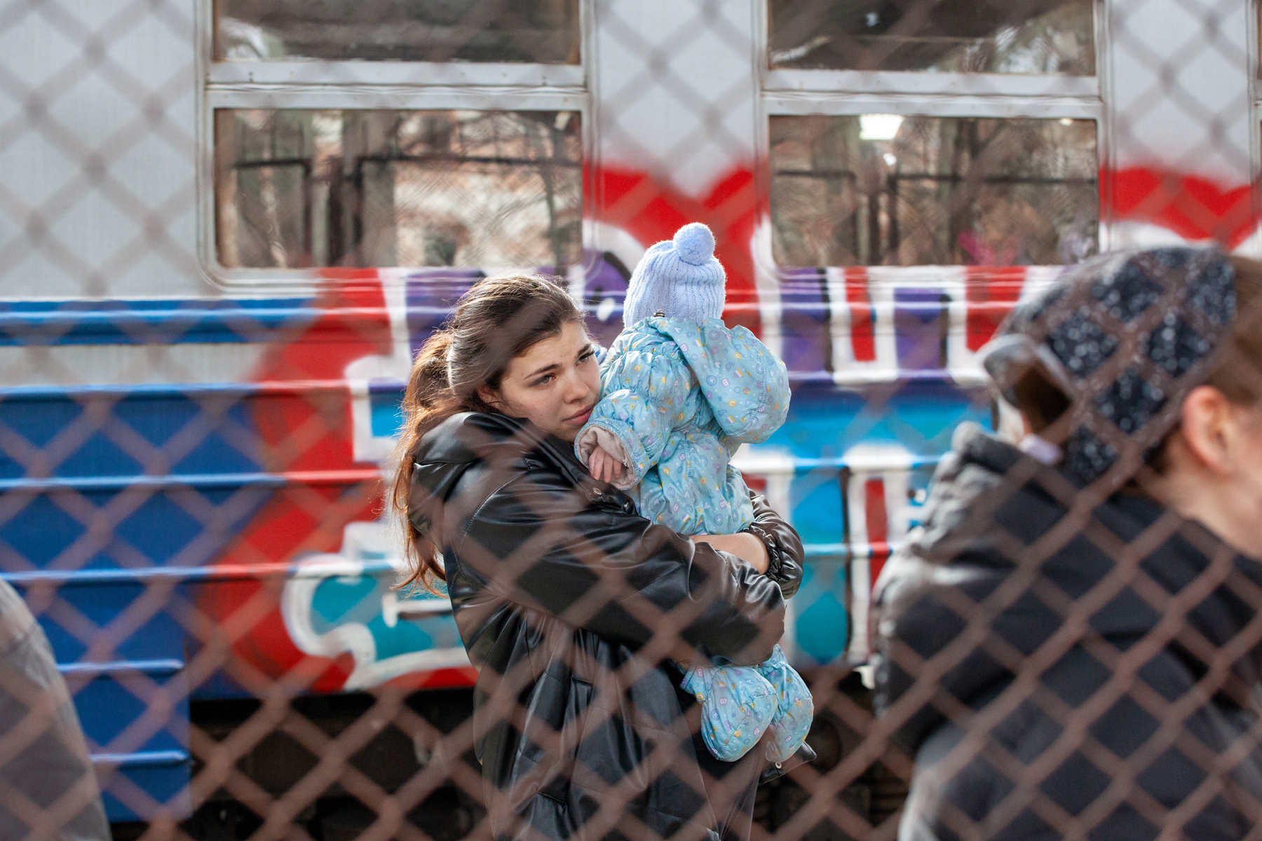 Des réfugiés ukrainiens arrivant en Pologne en février 2022. Crédits: Mirek Pruchnicki